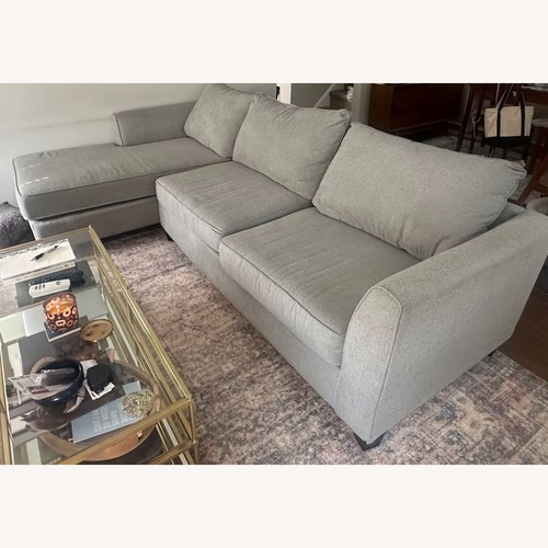 Used Raymour & Flanigan Gray Sectional for sale on AptDeco