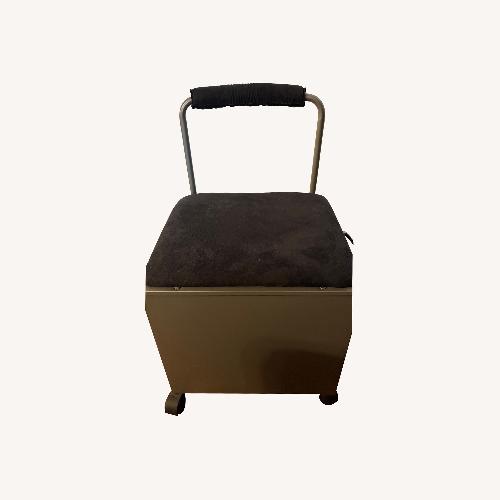 Used Ashley Furniture Black Suede Ottoman for sale on AptDeco