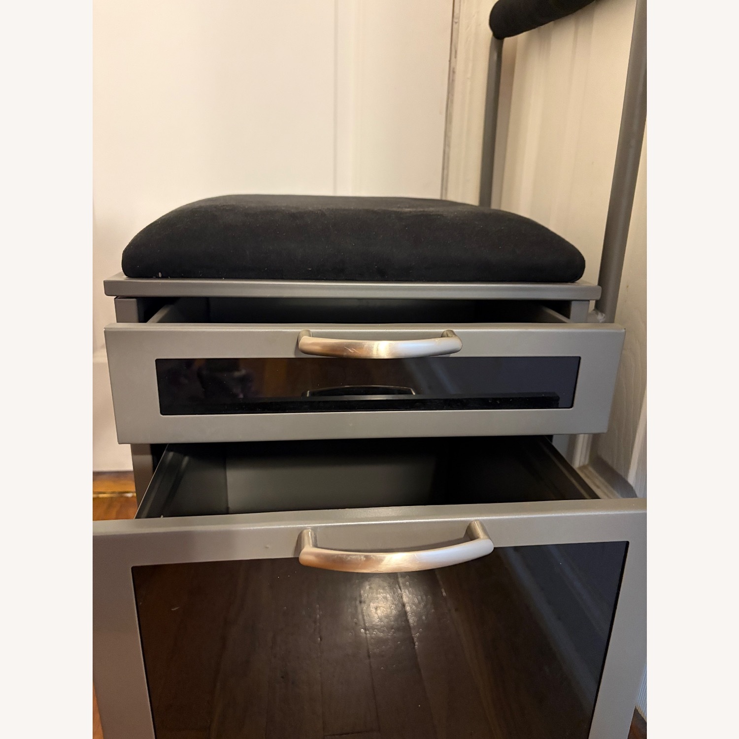 Ashley Furniture Black Suede Ottoman - image-3