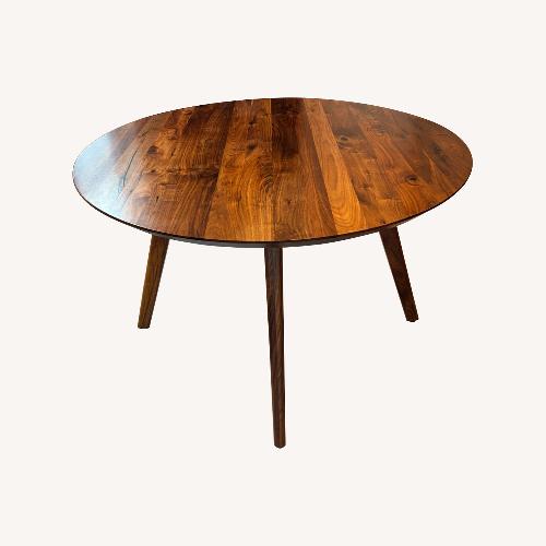 Used Arhaus Dark Brown Dining Table for sale on AptDeco