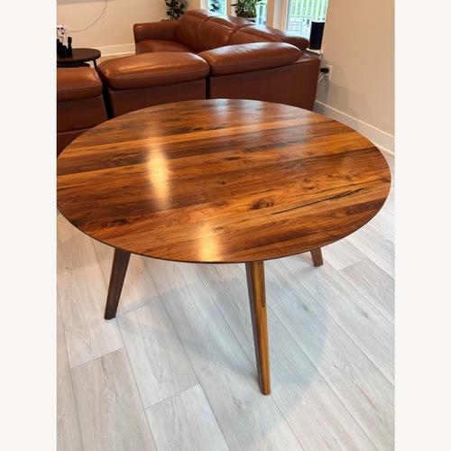 Used Arhaus Dark Brown Dining Table for sale on AptDeco