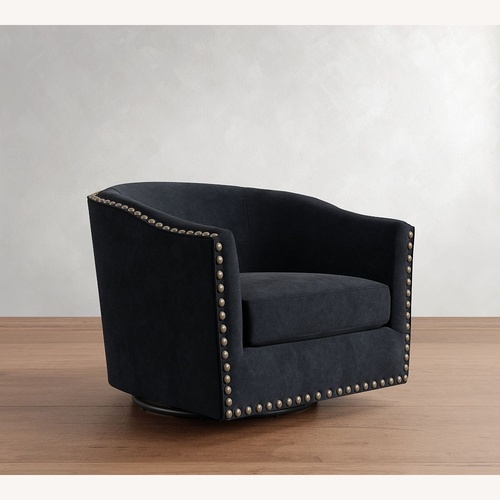 Used Pottery Barn Harlow Upholstered Swivel Blue Armchair for sale on AptDeco