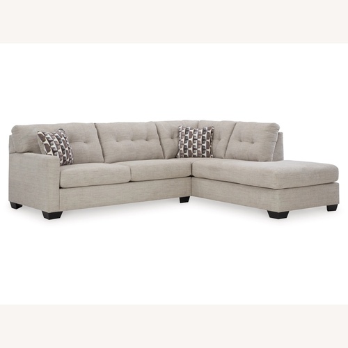 Used Ashley Gray Sectional Sleeper Sofa for sale on AptDeco