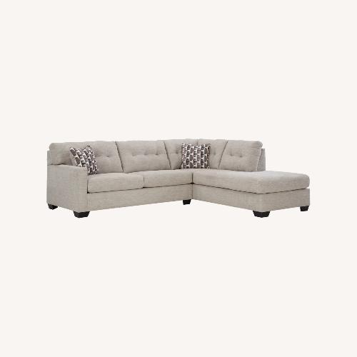Used Ashley Gray Sectional Sleeper Sofa for sale on AptDeco