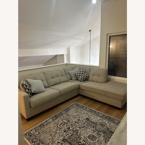 Used Ashley Gray Sectional Sleeper Sofa for sale on AptDeco