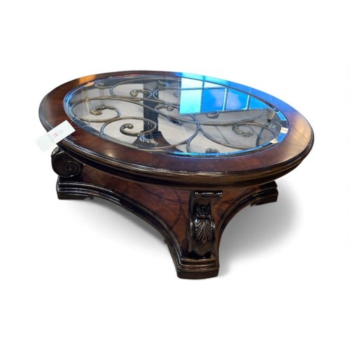 Used Ornate Glass Top Round Coffee Table for sale on AptDeco