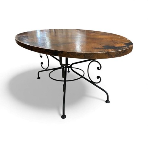 Used Arabesque Hammered Iron & Copper Oval Dining Table for sale on AptDeco