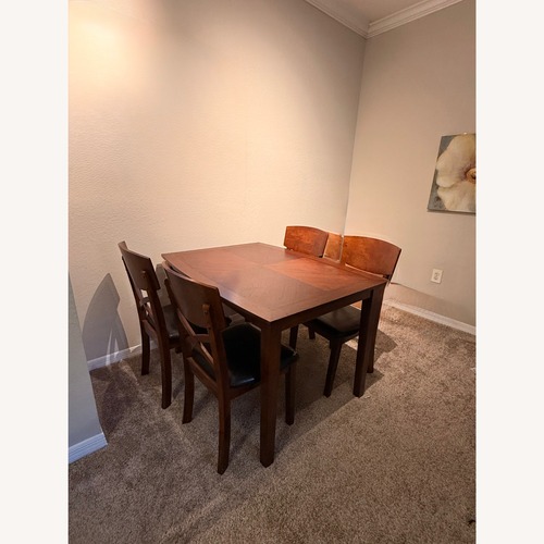 Used Vintage/Antique Finds Dark Brown Wood Dining Set for sale on AptDeco