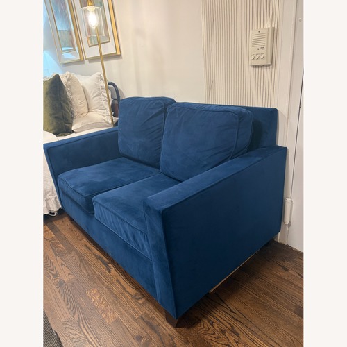 Used Pottery Barn Cameron Blue Velvet Loveseat for sale on AptDeco