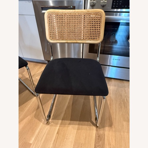 Used Joybird Kian Black and Cane Dining Chairs for sale on AptDeco