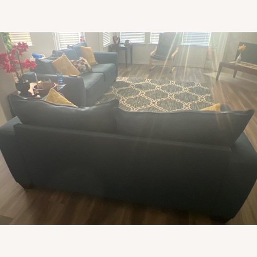 Used Rooms To Go 2 Piece Sectional for sale on AptDeco
