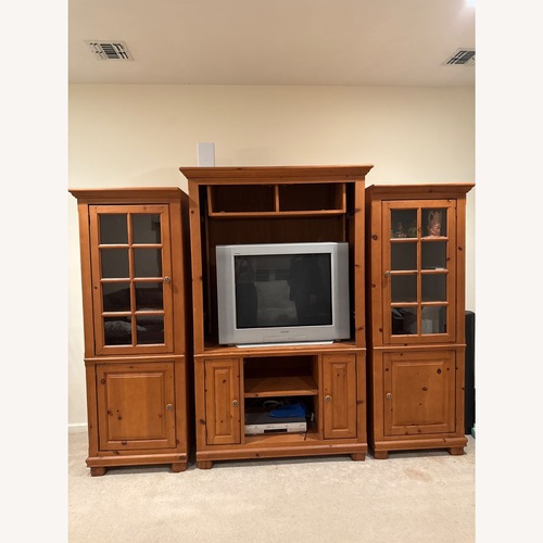 Used European Wood Classics Light Brown Wood Wall Unit for sale on AptDeco