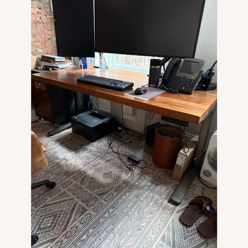 Used Uplift V3 Solid Wood Standing Desk for sale on AptDeco