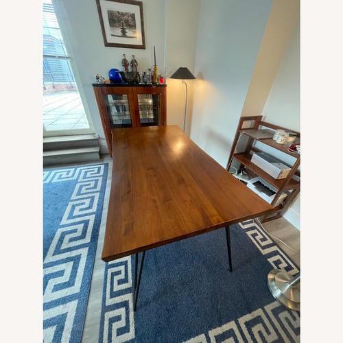 Used From The Source Dark Brown Dining Table for sale on AptDeco