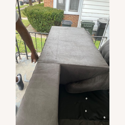 Used Action Wholesale Products 2 Piece Sectional for sale on AptDeco