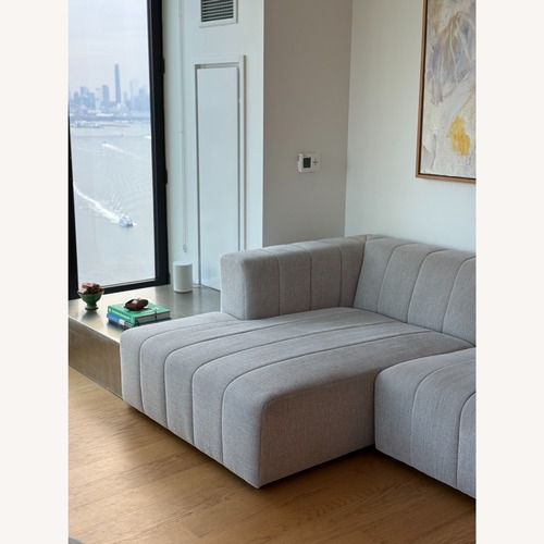 Used Four Hands Light Gray 2 Piece Sectional for sale on AptDeco