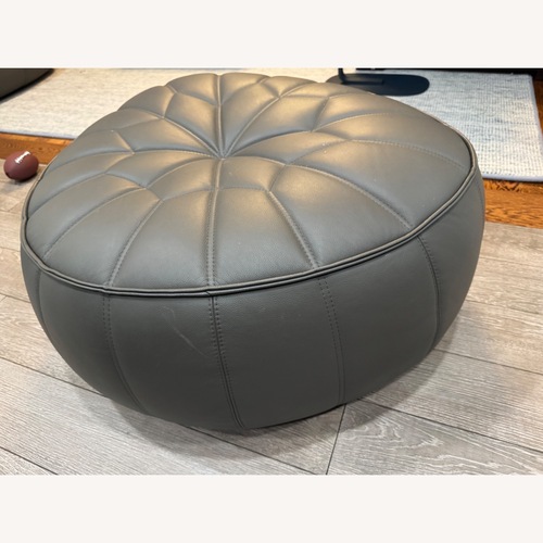 Used Ligne Roset Ottoman Dark Gray Leather Ottoman for sale on AptDeco