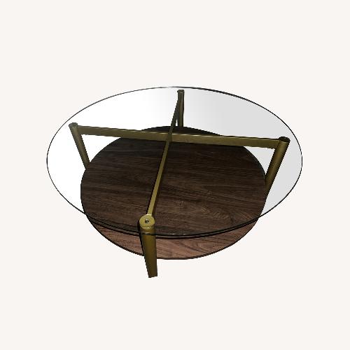Used Ikram Design Round Glass Coffee Table  for sale on AptDeco