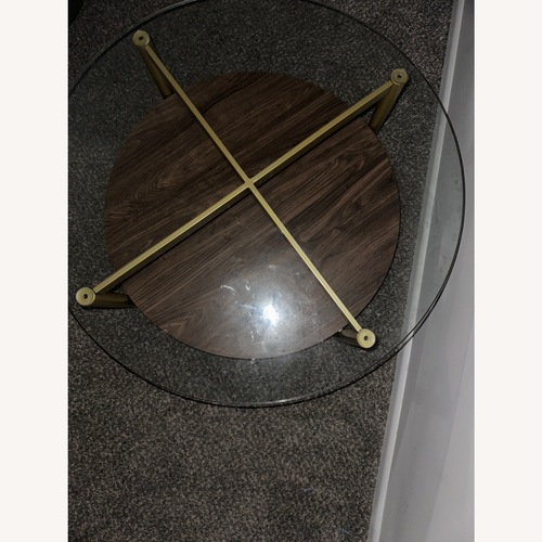Used Ikram Design Round Glass Coffee Table  for sale on AptDeco