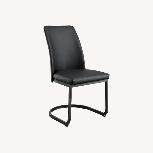 Used Saskia Black Leather Dining Chairs for sale on AptDeco