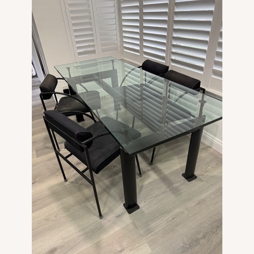 Used Modern In Design Black/ Glass Dining Tables for sale on AptDeco