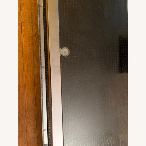 Used Raymour & Flanigan Transparent Wood Coffee Table for sale on AptDeco