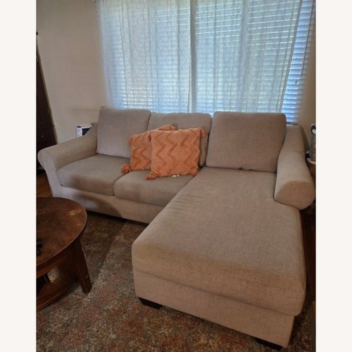 Used Ashley Furniture Carnaby Natural Fabric 2 Piece Sectional for sale on AptDeco