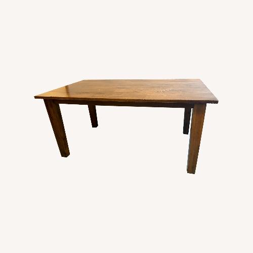 Used Basque 65" Dark Brown Solid Wood Dining Table for sale on AptDeco