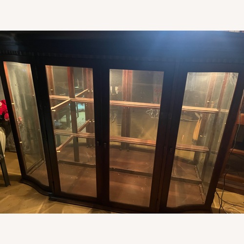 Used Vintage/Antique Finds Dark Brown Wood Armoire for sale on AptDeco