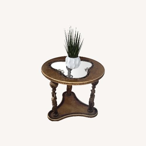 Used Gold Glass Side Table With Brass Sculpture Legs  for sale on AptDeco
