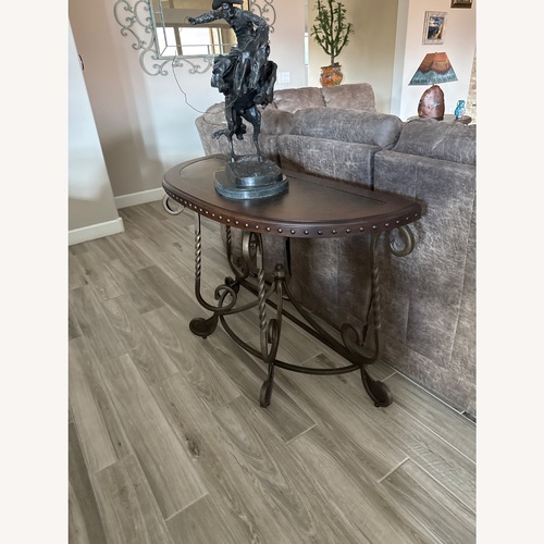 Used Ashley Furniture Dark Brown Coffee Table for sale on AptDeco