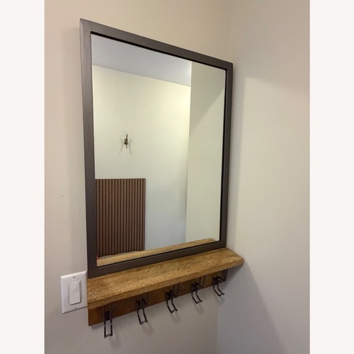 Used West Elm Dark Gray Metal Wall Mirror for sale on AptDeco