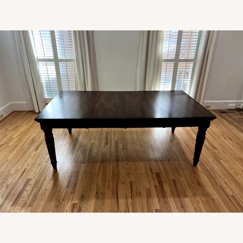 Used World Market Dark Brown Wood Dining Table for sale on AptDeco