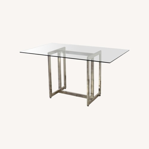 Used West Elm Silver 60" Chrome and Glass Dining Table for sale on AptDeco