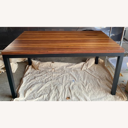 Used Crate & Barrel Parsons Recycled Multi-Wood Dining Table for sale on AptDeco