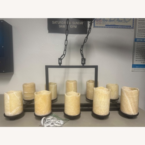 Used Maxim Luminous 10 Light Chandelier for sale on AptDeco