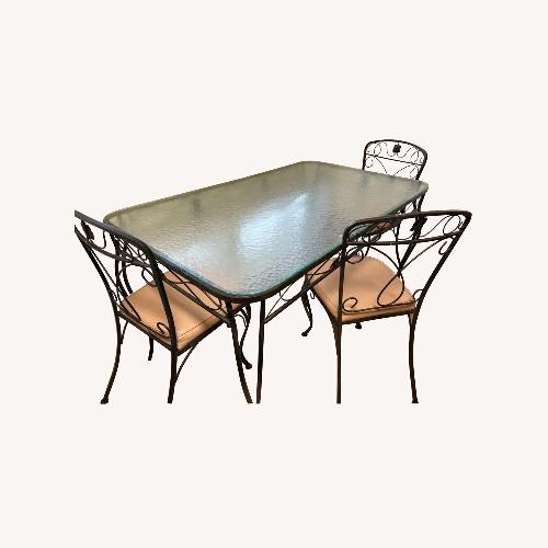 Used Vintage 1970 Glass & Wrought Iron Patio Set for sale on AptDeco