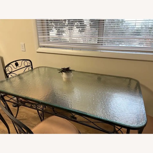 Used Vintage 1970 Glass & Wrought Iron Patio Set for sale on AptDeco