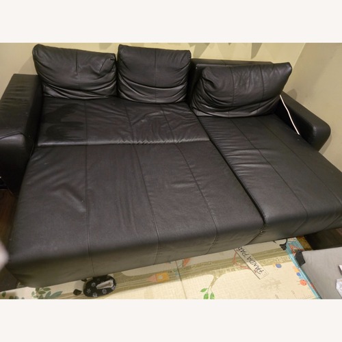 Used Ashley Furniture Black Leather 3+ Piece Sectional for sale on AptDeco