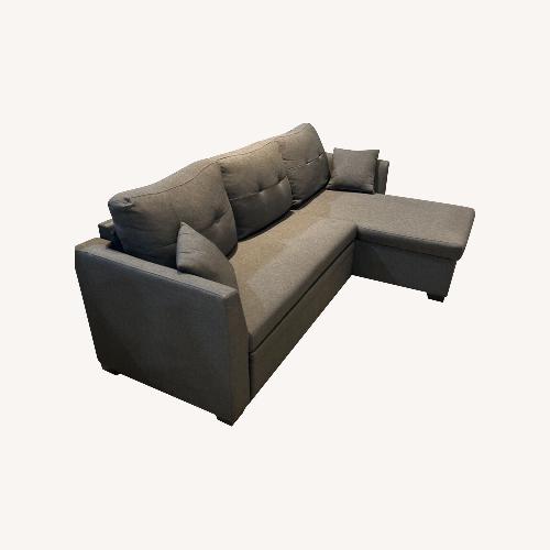 Used Navaeh Storage & Sleeper Sectional Gray for sale on AptDeco