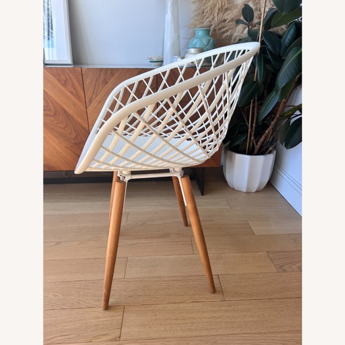 Used CB2 Sidera Chair White Wood Dining Chairs for sale on AptDeco