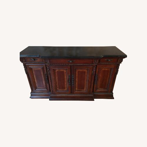 Used Universal Furniture Dark Brown Wood Sideboard for sale on AptDeco