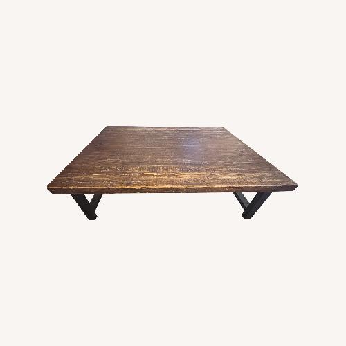 Used Dark Brown Wood Coffee Table for sale on AptDeco