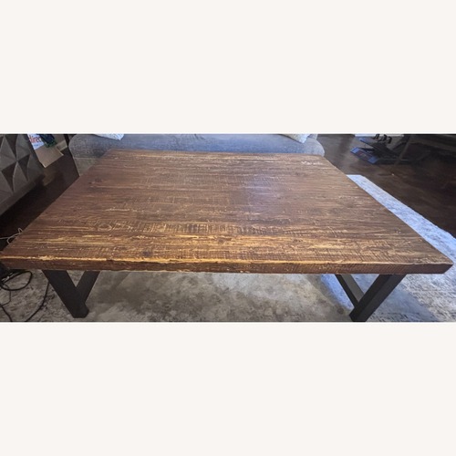 Used Dark Brown Wood Coffee Table for sale on AptDeco