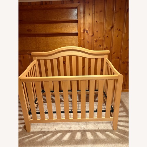 Used Natural Wood Crib for sale on AptDeco