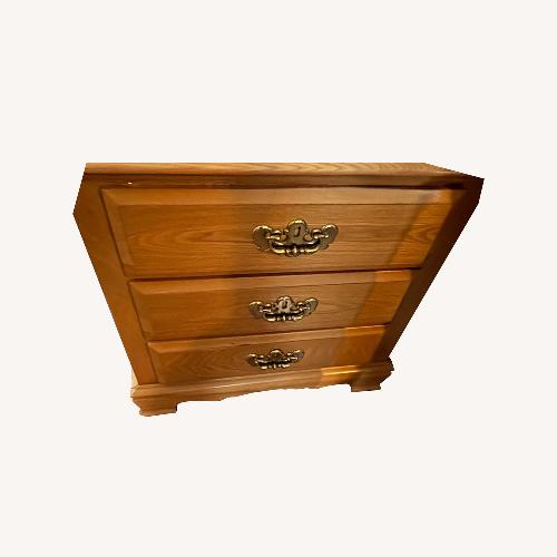 Used Raymour & Flanigan Light Brown Wood Nightstand for sale on AptDeco