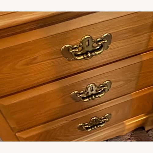 Used Raymour & Flanigan Light Brown Wood Nightstand for sale on AptDeco