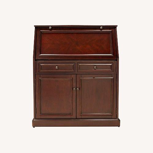 Used Raymour & Flanigan Dark Brown Wood Armoire for sale on AptDeco