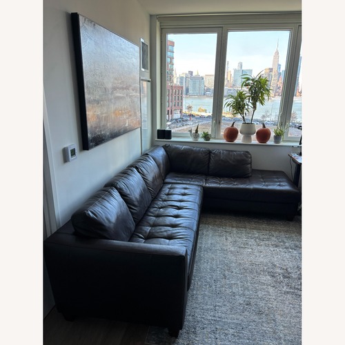 Used Dark Brown Leather 2 Piece Sectional for sale on AptDeco