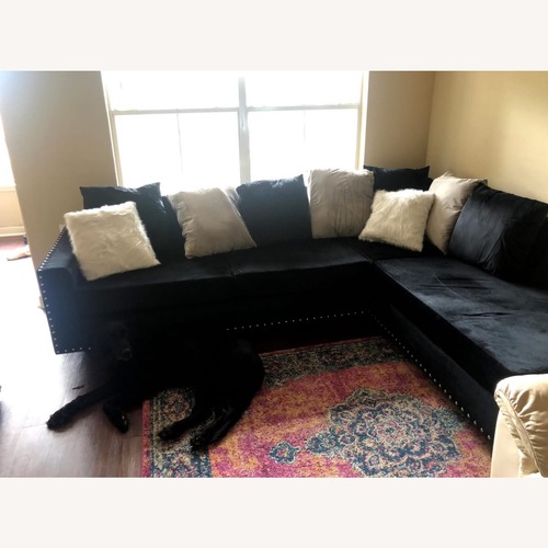 Used Black 2 Piece Sectional for sale on AptDeco